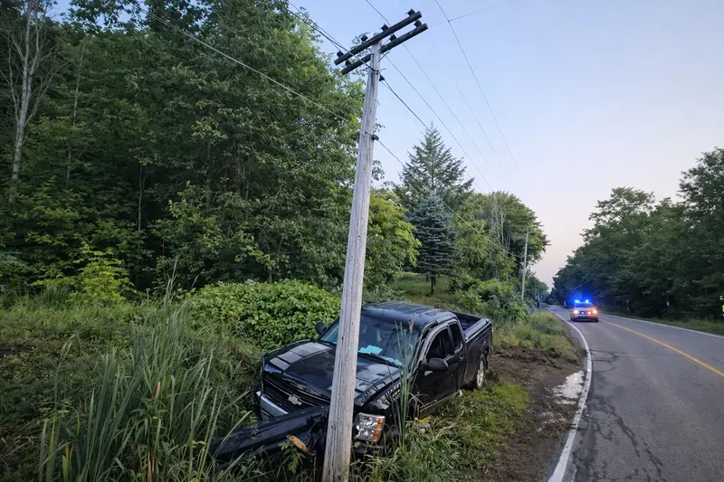 Emergency vehicle near roadside utility incident